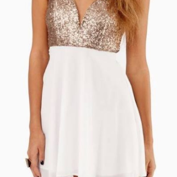 white and gold flowy dress